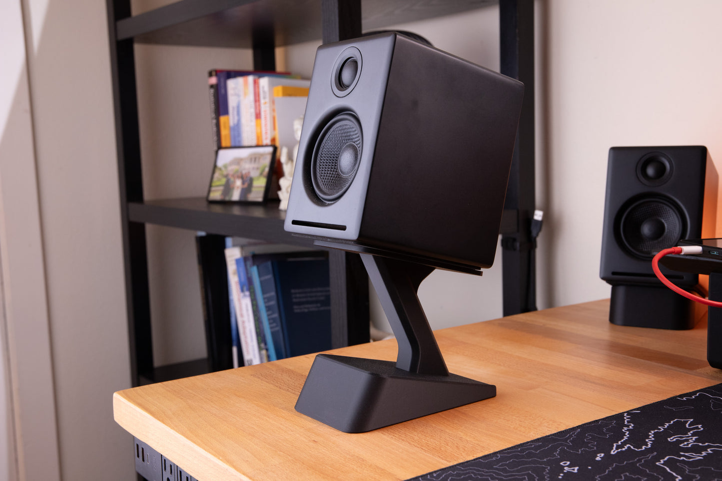 3d printed raised speaker stand with hidden storage, holding the audio engine A2+ speakers