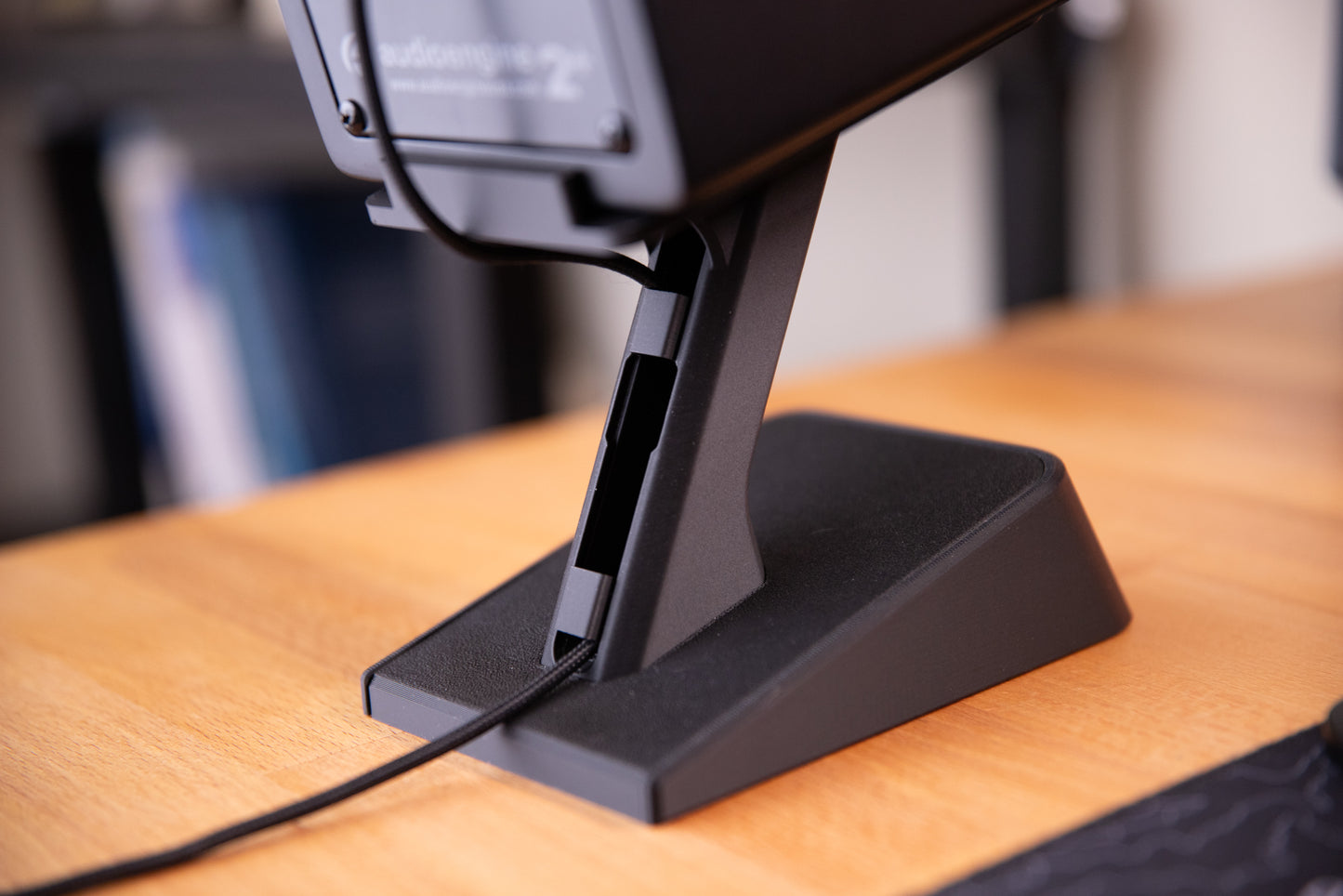 3d printed raised speaker stand with hidden storage, rear view showing the cable management feature