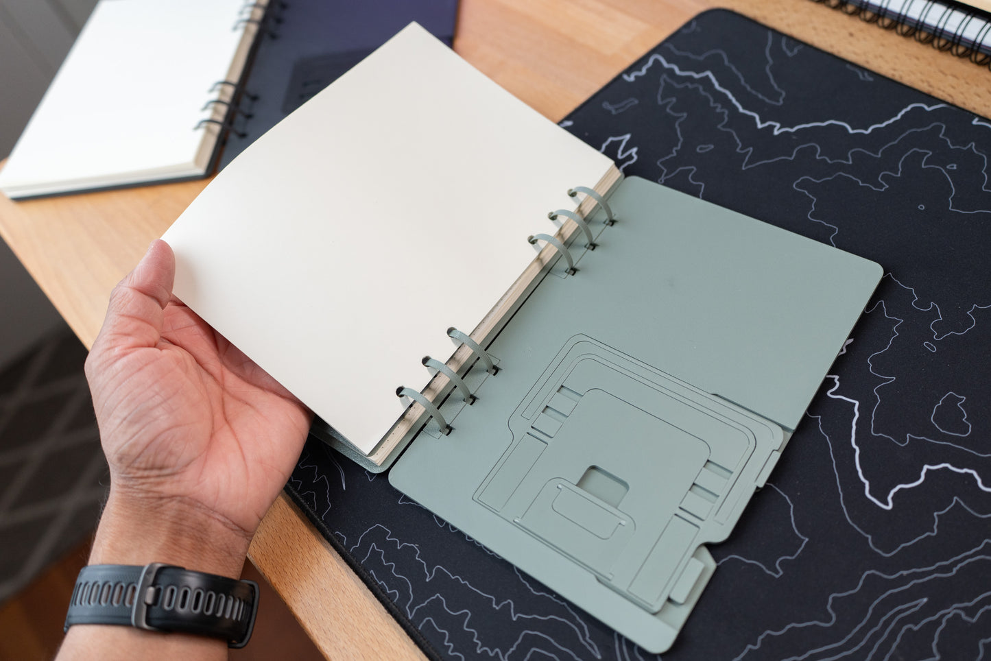 3d printed notebook with back cover showing the hidden notebook stand