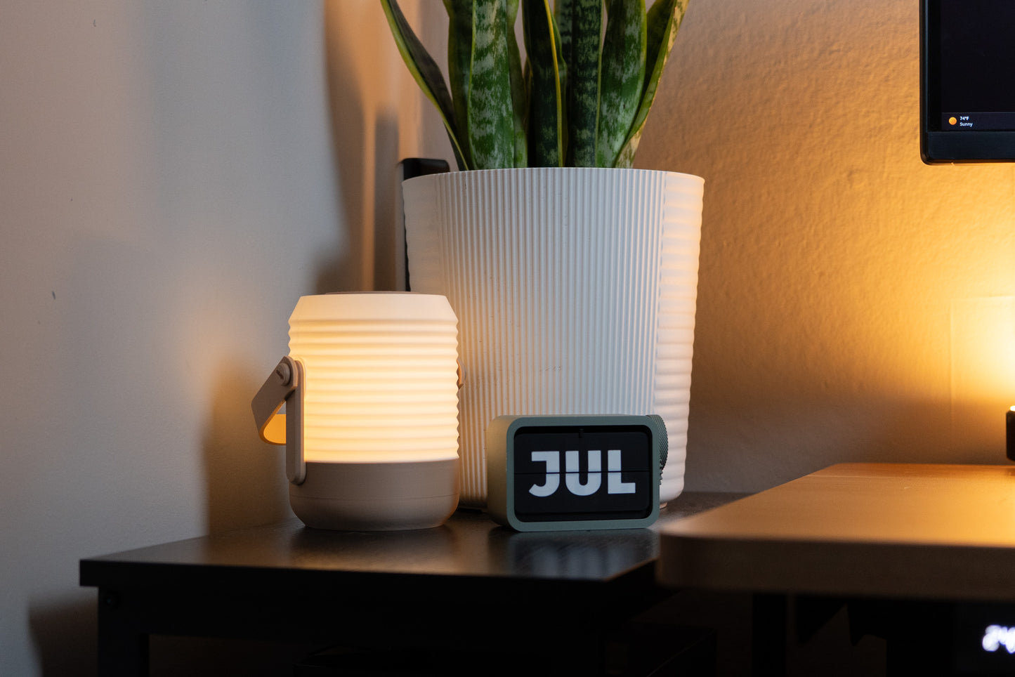 3d printed lantern next to flip calendar