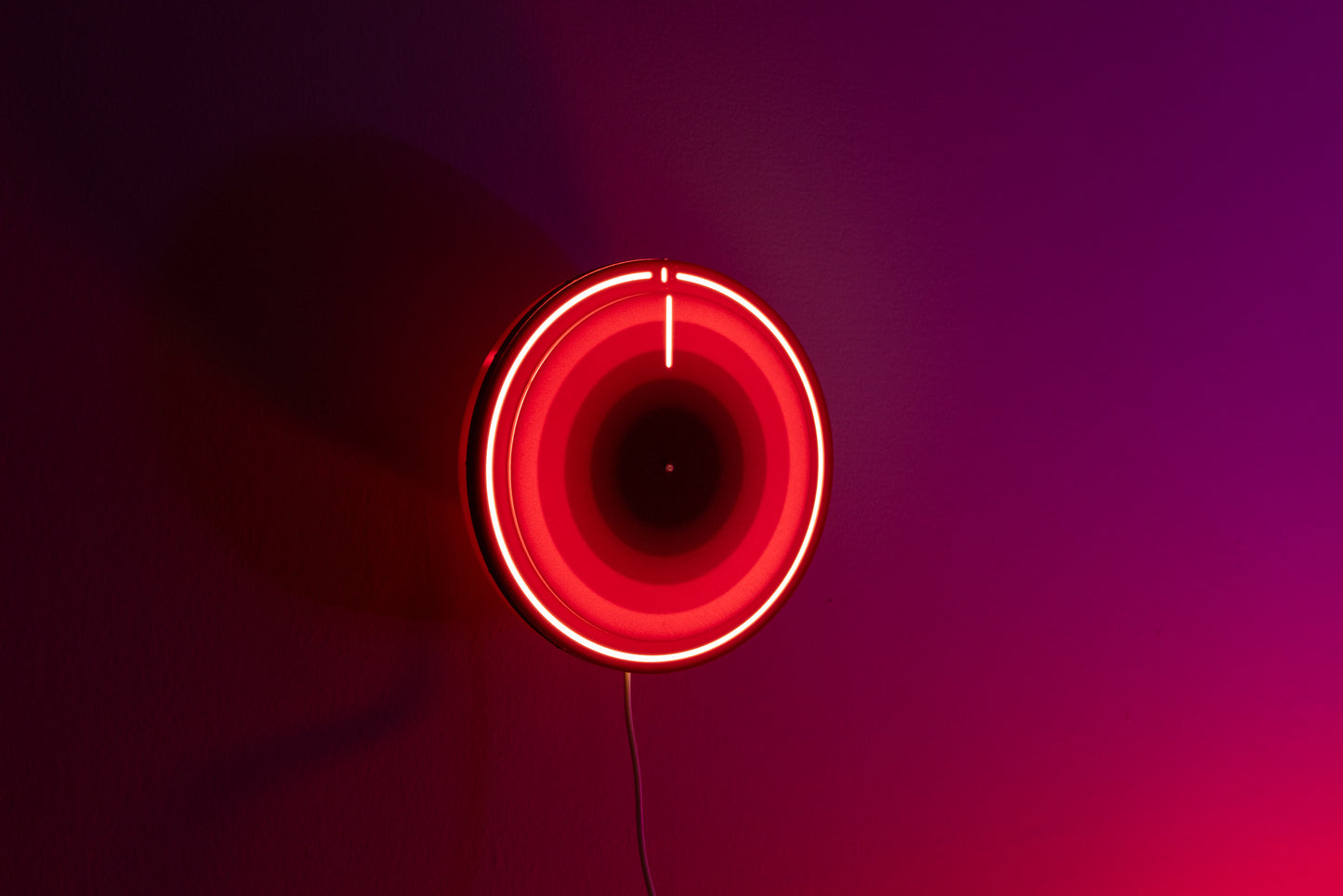 3d printed backlit clock mounted on wall