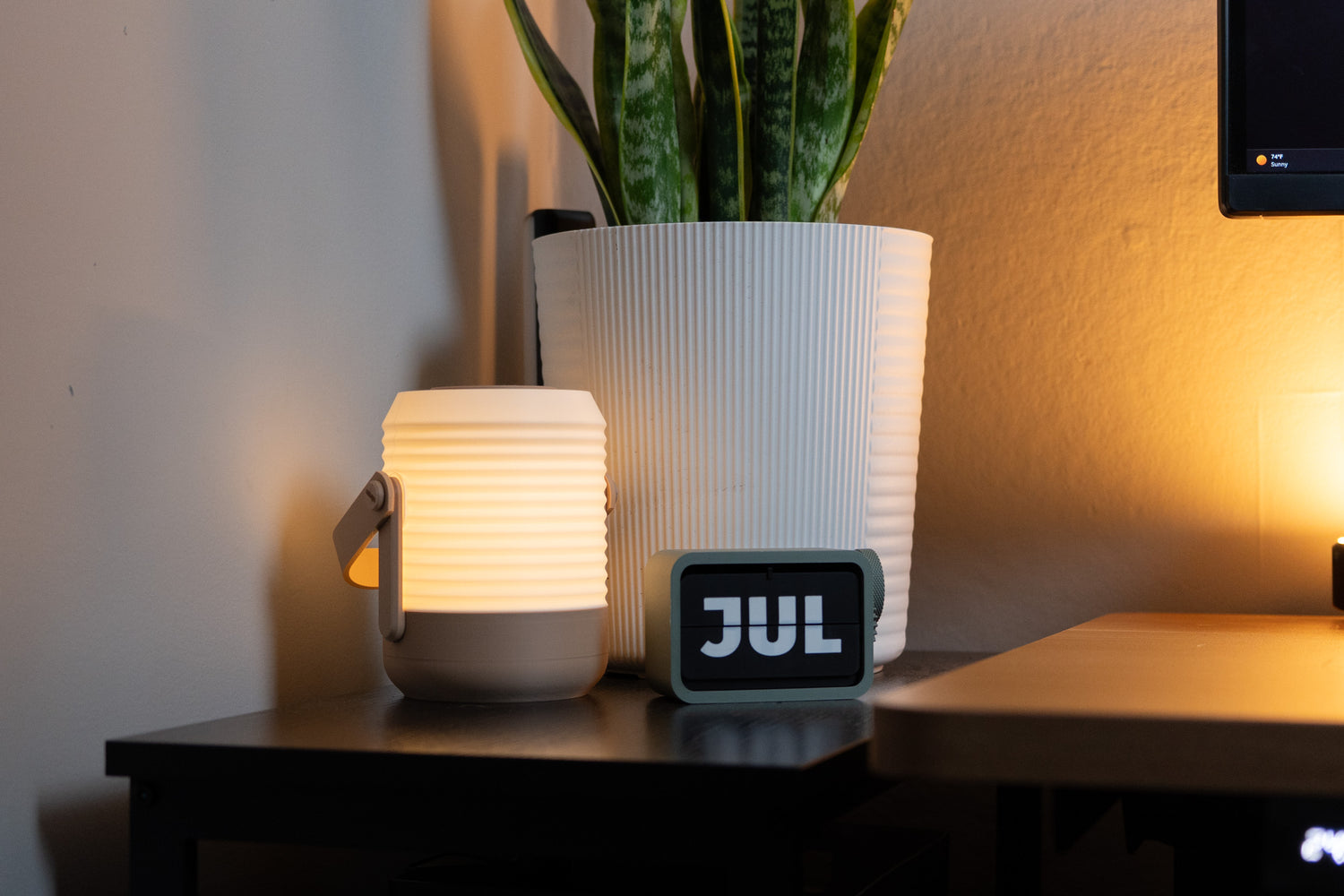 3d printed lantern next to flip calendar
